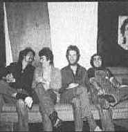 (Left to right:) Kieth Sykes, John Prine, Loudon Wainwright, and Steve Goodman.  Backstage at the Bitter End - September 1972. �1993 RHINO RECORDS, INC. PHOTO: CHUCK PULIN