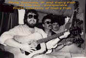Phillip Donnelly, John Prine, and Garry Fish on the bus ... somewhere
